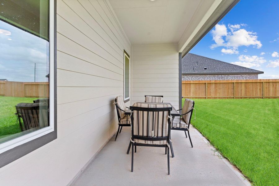Exterior details and patio area of a home in Tamarron, Fulshear (Image 4). Exterior details and patio area of a home in Tamarron, Fulshear (Image 4).