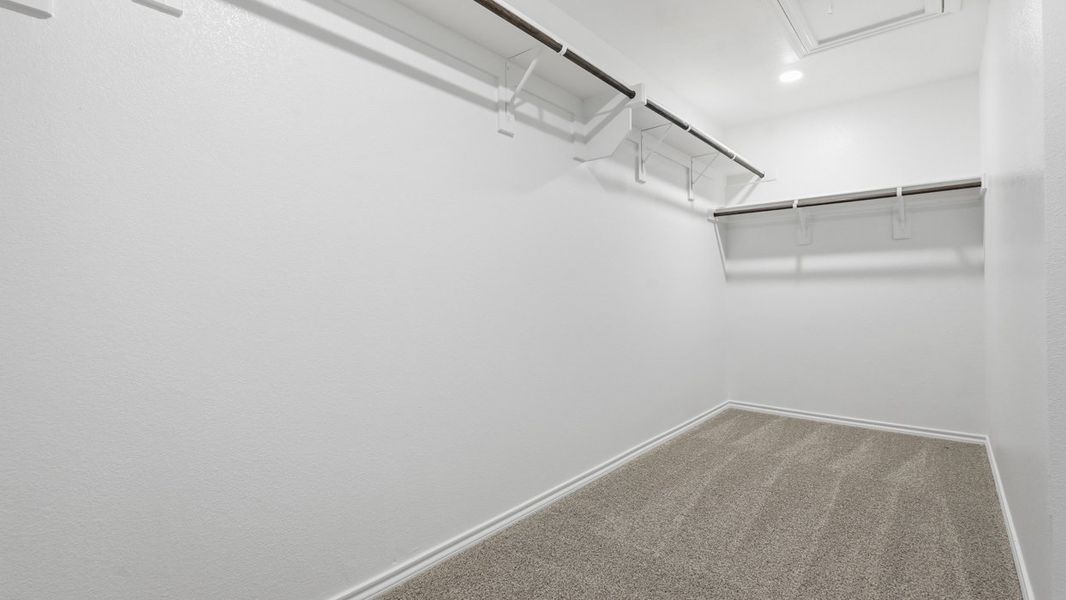 Representative unfurnished interior of a home built from the Damara by D.R. Horton in Windrose, Pilot Point (Image 9).