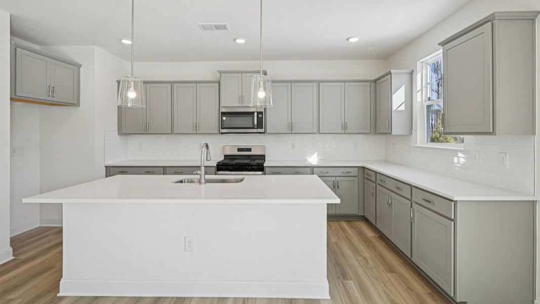 Representative furnished interior of a home built from the Wagener by DRB Homes in Weavers Pointe, Zebulon (Image 12).