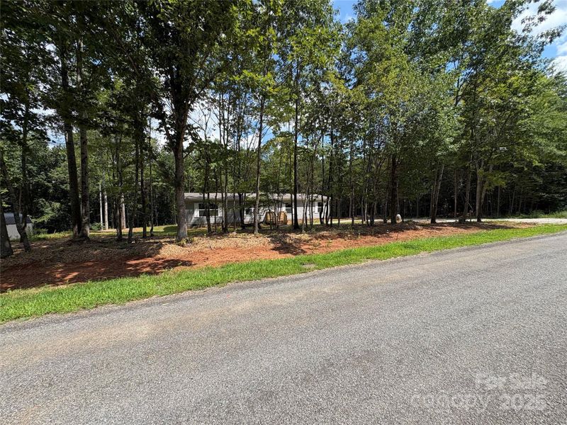Front exterior of a new home in , Yadkinville, NC, highlighting curb appeal (Image 6).