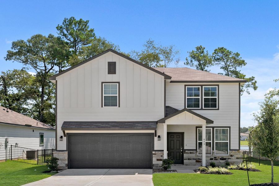 Front exterior of a new home in Lakes at Crockett Martin, Conroe, TX, highlighting curb appeal (Image 11). Front exterior of a new home in Lakes at Crockett Martin, Conroe, TX, highlighting curb appeal (Image 11).
