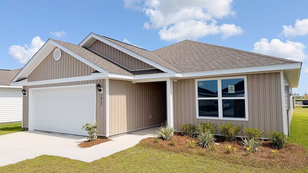 Front exterior of a new home in Liberty, Panama City, FL, highlighting curb appeal (Image 2). Front exterior of a new home in Liberty, Panama City, FL, highlighting curb appeal (Image 2).