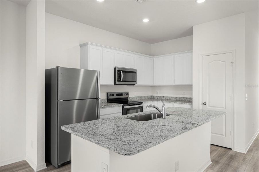 Furnished interior view inside a new home in Gum Lake Preserve, Lake Alfred (Image 7).