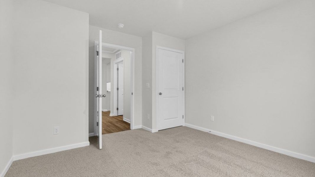 Spacious, unfurnished interior of a new home in Mangum Farms, Stem (Image 25).