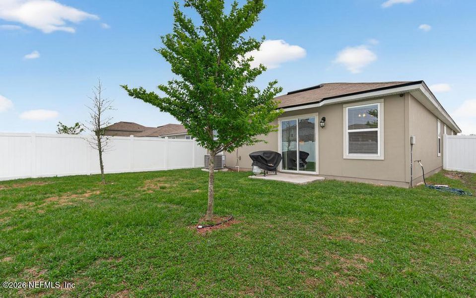 Exterior details and patio area of a home in Cross Creek Express, Green Cove Springs (Image 26).