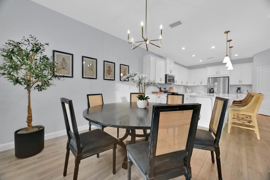 Furnished interior view inside a new home in Tradition - Cadence, Port St. Lucie (Image 11).