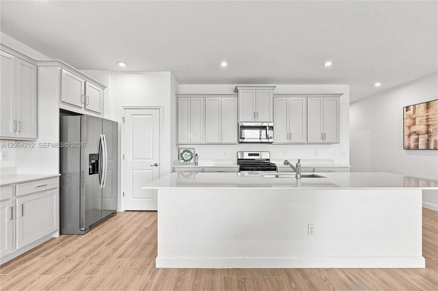 Furnished interior view inside a new home in Tradition, Port St. Lucie (Image 8).