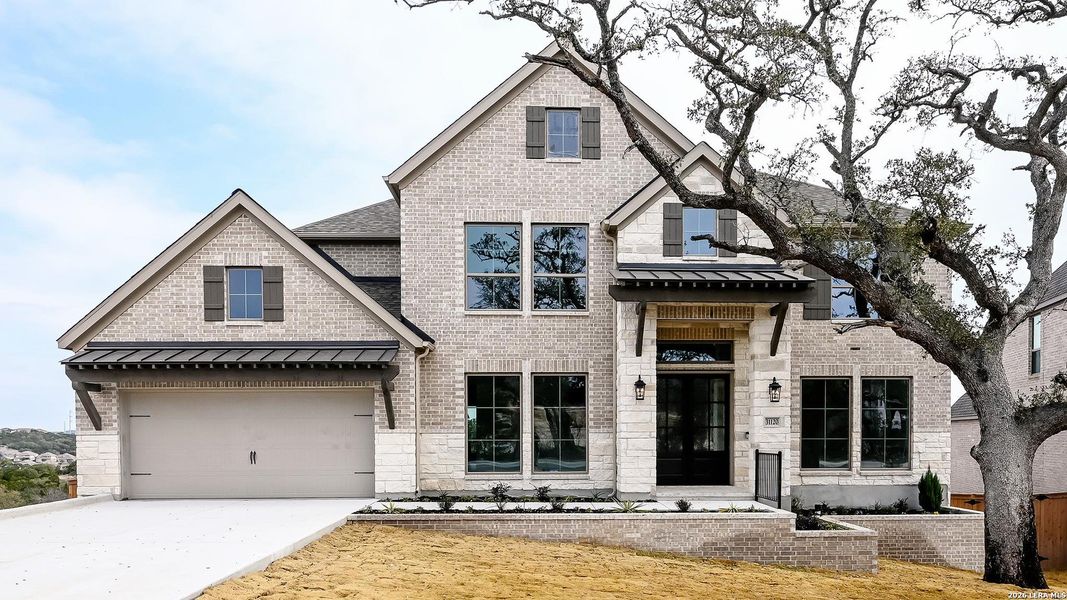 Front exterior of a new home in Johnson Ranch, Bulverde, TX, highlighting curb appeal (Image 20). Front exterior of a new home in Johnson Ranch, Bulverde, TX, highlighting curb appeal (Image 20).