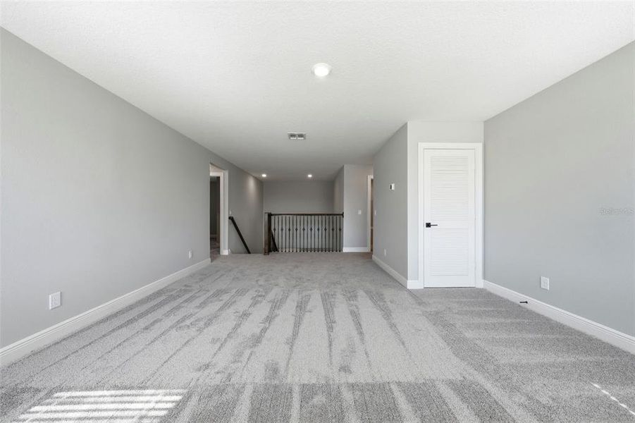 Spacious, unfurnished interior of a new home in Gum Lake Preserve, Lake Alfred (Image 41).