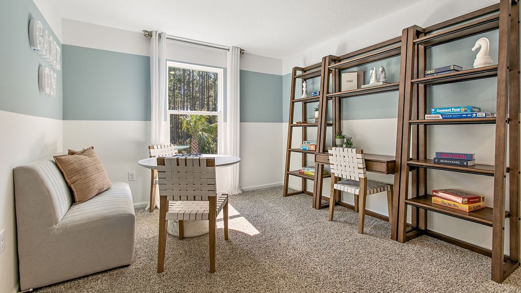 Representative furnished interior of a home built from the HAYDEN II by D.R. Horton in Copes Landing, Jacksonville (Image 25).