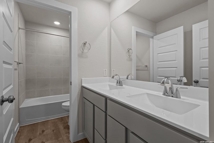 Furnished interior view inside a new home in Spring Creek, San Antonio (Image 12).
