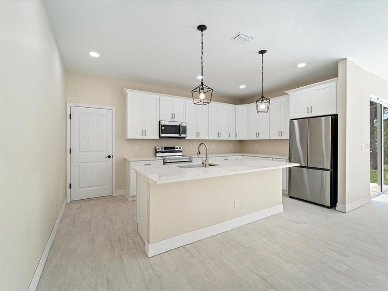 Furnished interior view inside a new home in , Port Charlotte (Image 7). Furnished interior view inside a new home in , Port Charlotte (Image 7).