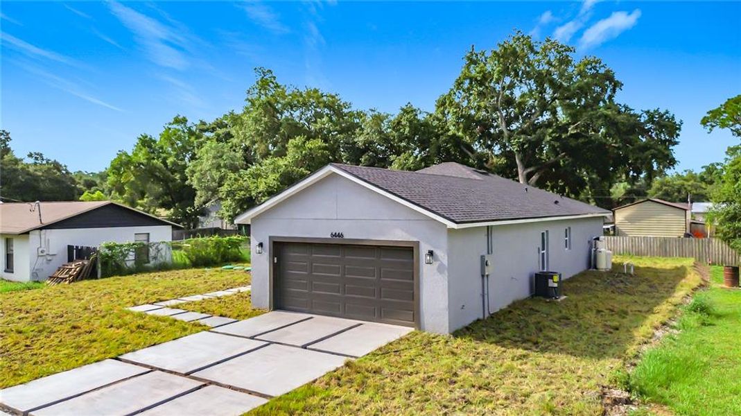 Front exterior of a new home in , St. Cloud, FL, highlighting curb appeal (Image 22).