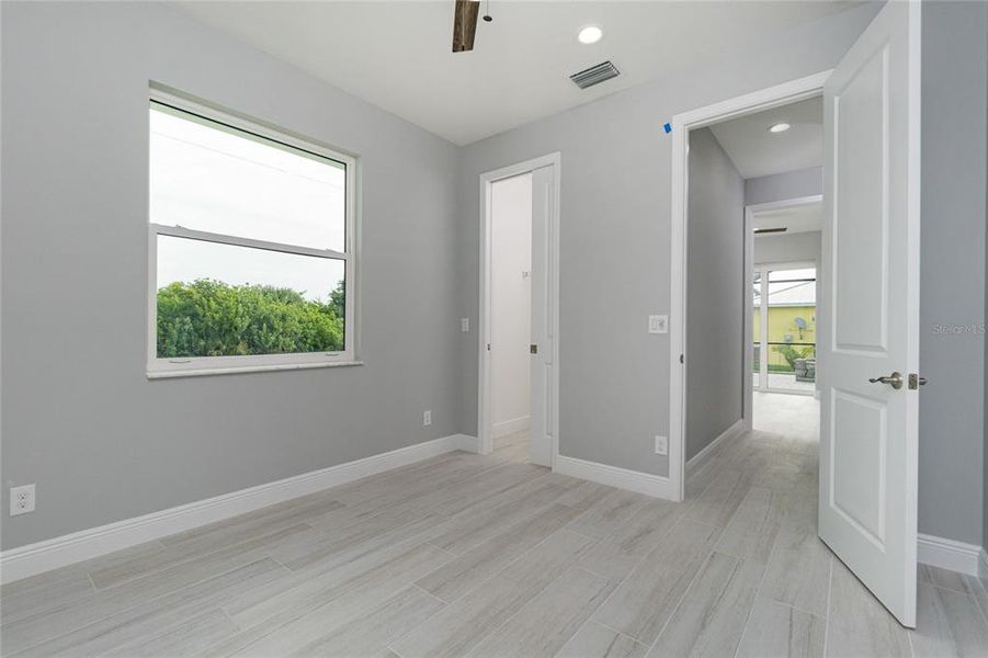 Spacious, unfurnished interior of a new home in , Port Charlotte (Image 35).