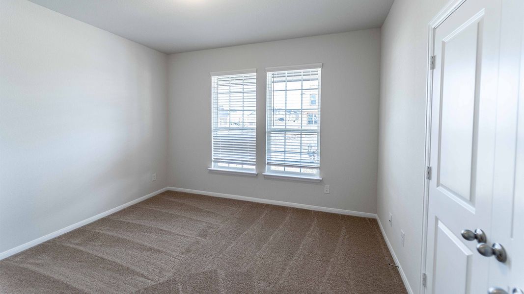Spacious, unfurnished interior of a new home in Sunfield, Buda (Image 33). Spacious, unfurnished interior of a new home in Sunfield, Buda (Image 33).