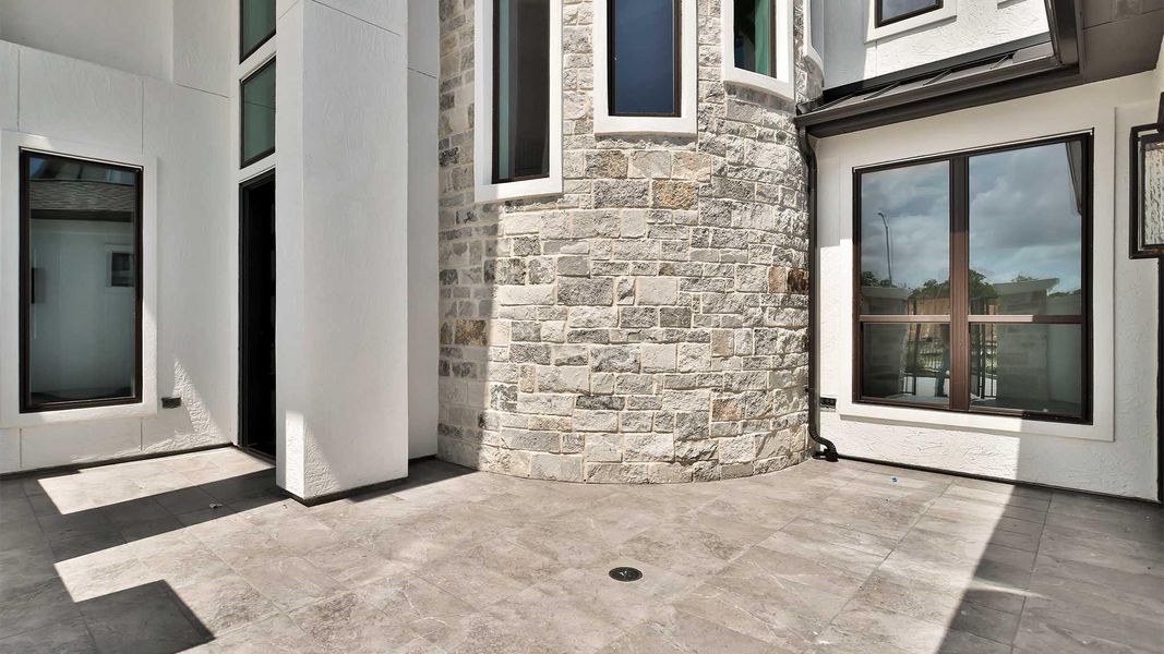 Exterior details and patio area of a home in Sienna, Missouri City (Image 2). Exterior details and patio area of a home in Sienna, Missouri City (Image 2).
