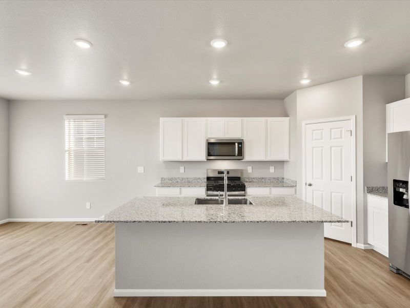 Furnished interior view inside a new home in Buffalo Highlands: The Flora Collection, Commerce City (Image 4).