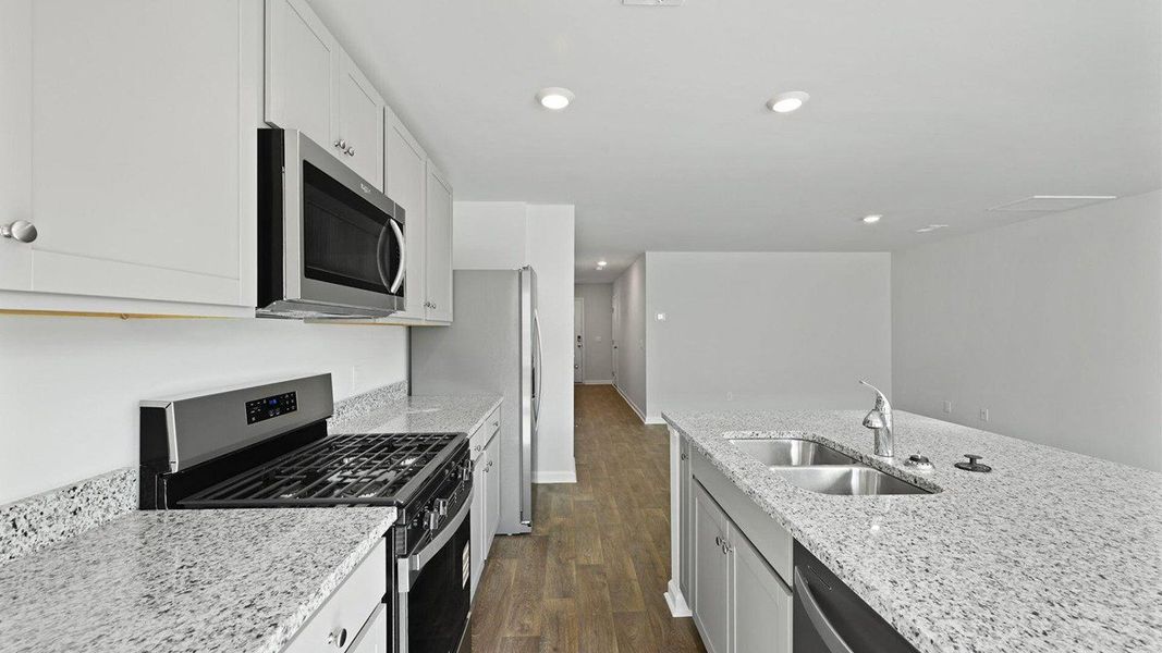 Furnished interior view inside a new home in Pine Hills Townhomes at Cane Bay, Summerville (Image 10).