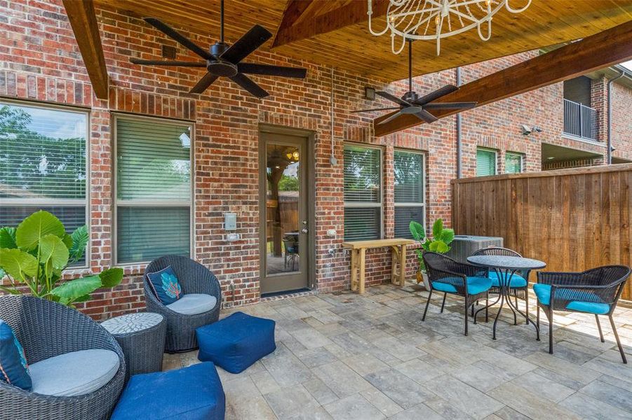 View of terrace featuring ceiling fan