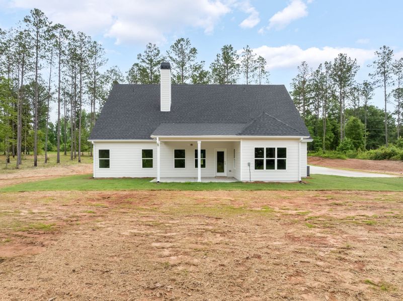Front exterior of a new home in Stewart Estates, Meansville, GA, highlighting curb appeal (Image 24).