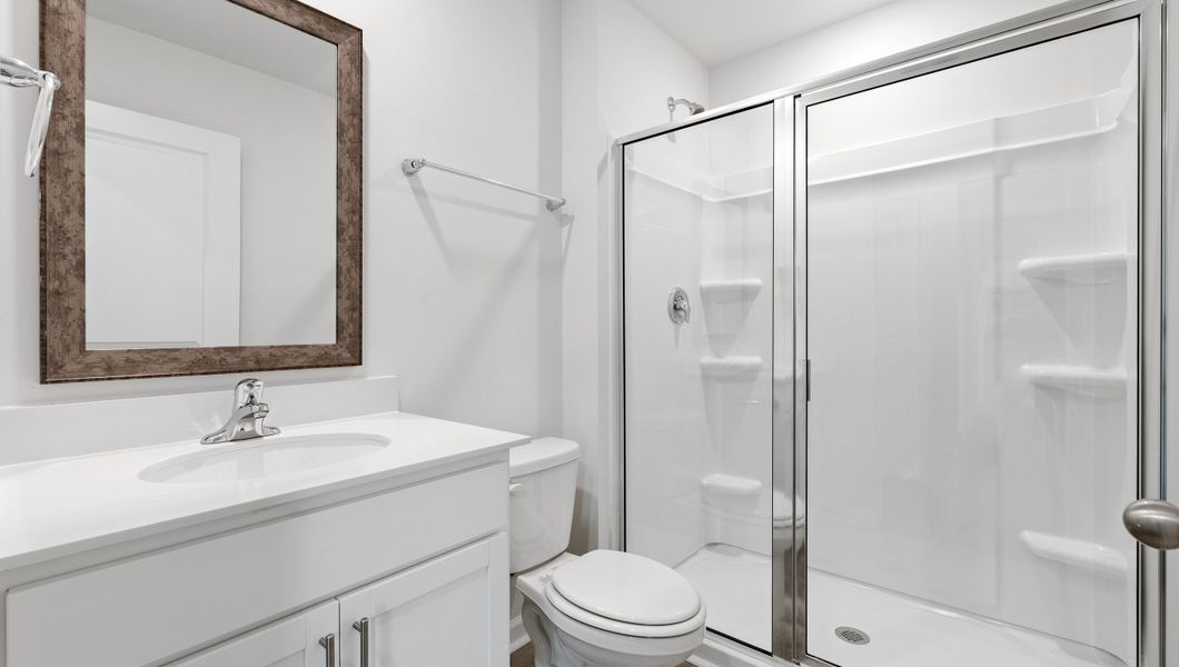 Furnished interior view inside a new home in Lakestone, Woodruff (Image 11).