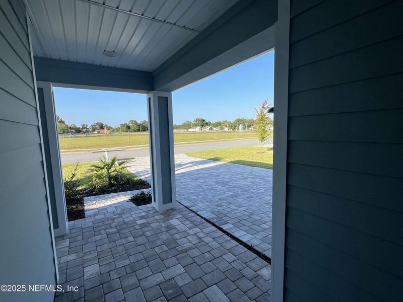 Exterior details and patio area of a home in American Village, Palm Coast (Image 29).
