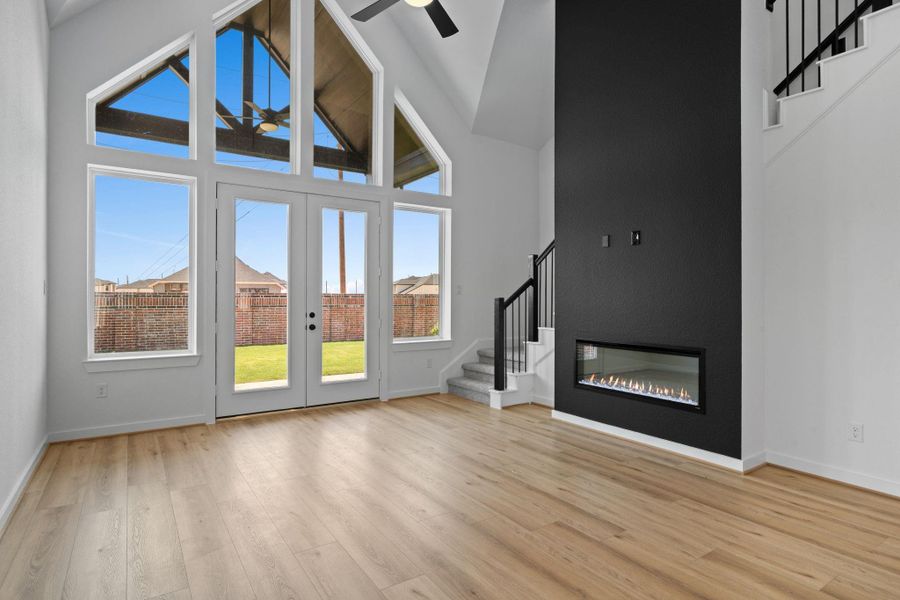 The fireplace adds a warm touch this open concept home. The fireplace adds a warm touch this open concept home.