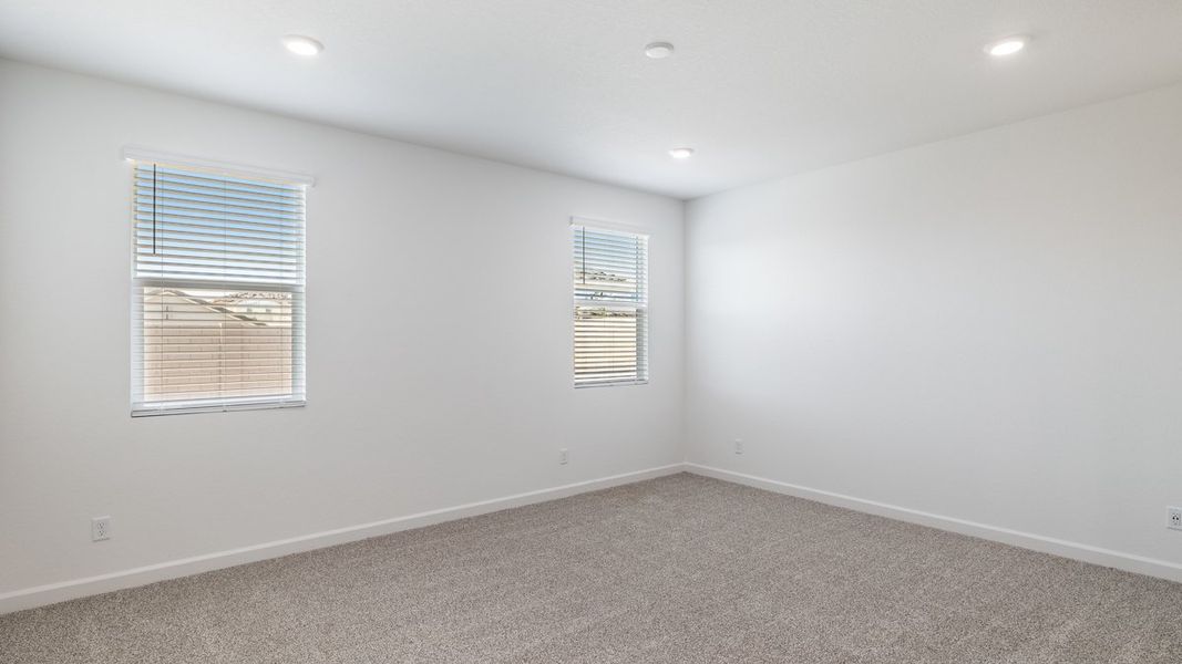 Spacious, unfurnished interior of a new home in Zanjero Pass, Waddell (Image 22).