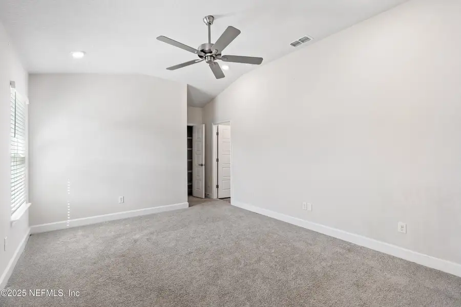 Spacious, unfurnished interior of a new home in Shadow Crest at Rolling Hills, Green Cove Springs (Image 12).
