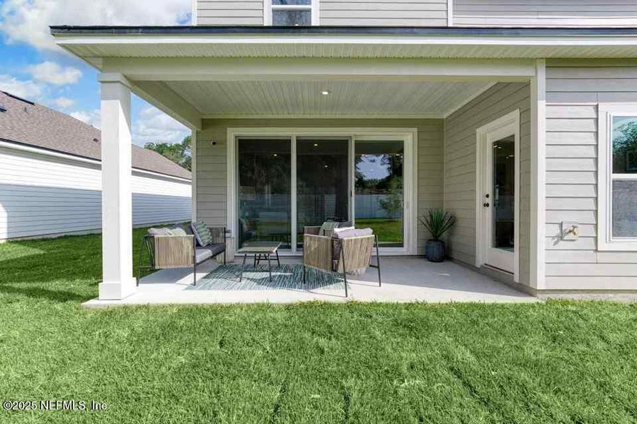 Exterior details and patio area of a home in , Flagler Beach (Image 2). Exterior details and patio area of a home in , Flagler Beach (Image 2).