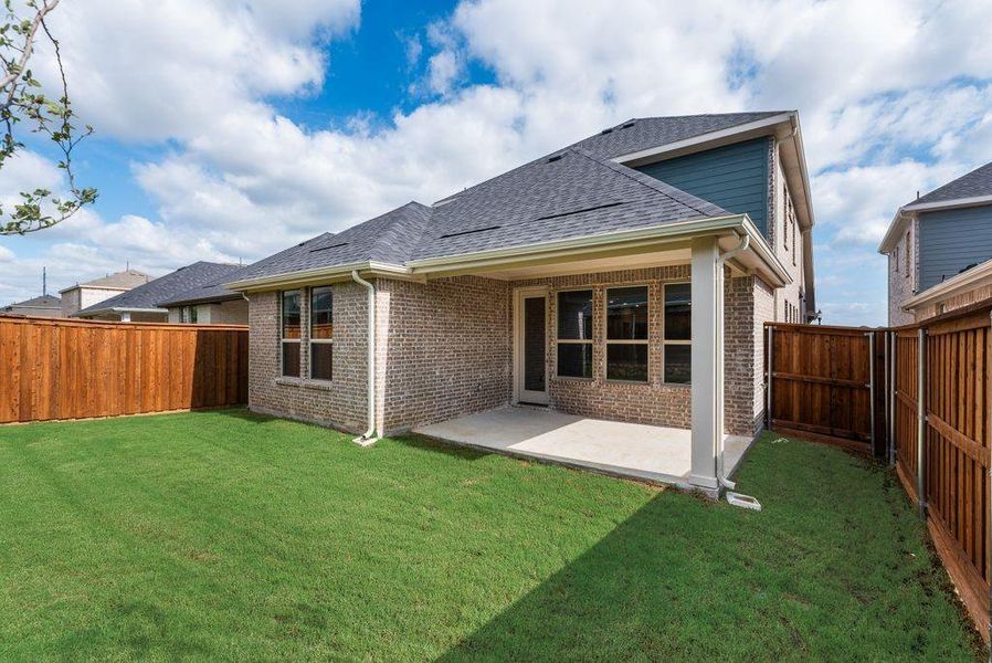 Exterior details and patio area of a home in Spiritas Ranch, Little Elm (Image 22). Exterior details and patio area of a home in Spiritas Ranch, Little Elm (Image 22).