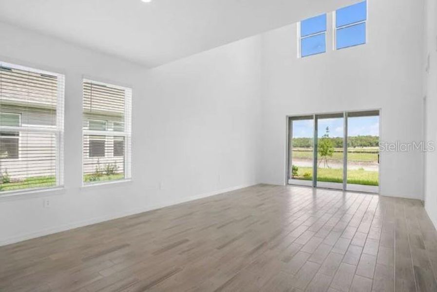 Spacious, unfurnished interior of a new home in Center Lake Ranch Community Group Page, St. Cloud (Image 9).