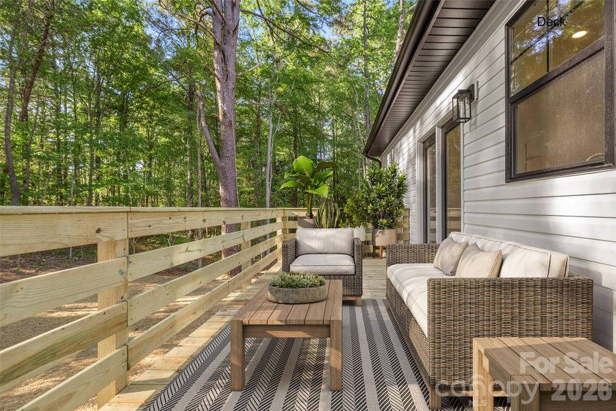 Rear deck overlooking the serene rear yard