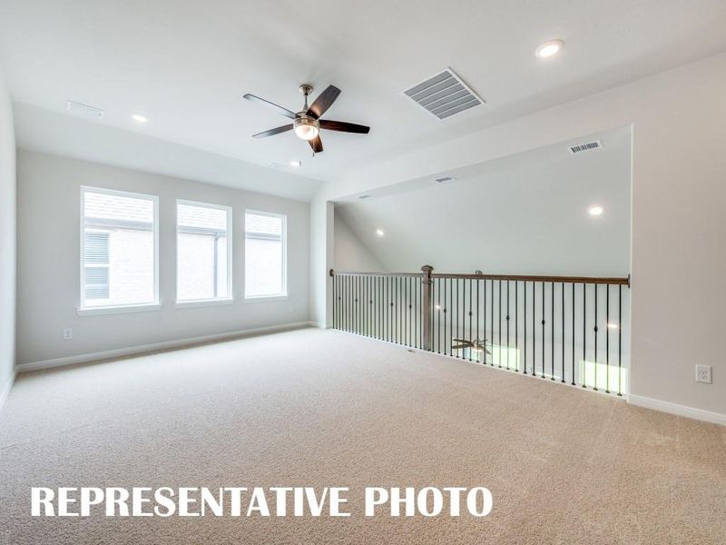 Light, bright and airy, the family fun time never ends in this over the top game room!  REPRESENTATIVE PHOTO