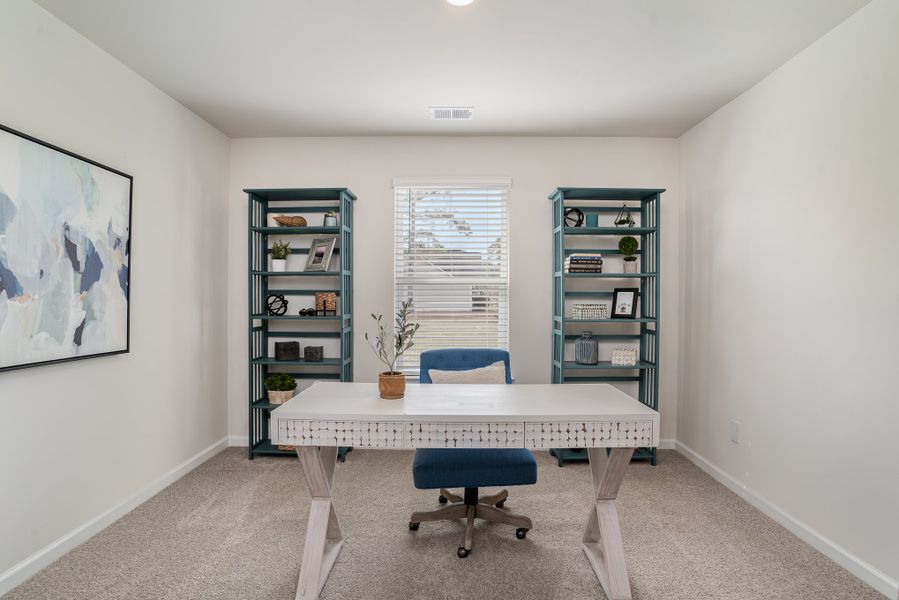 Representative furnished interior of a home built from the CALI by D.R. Horton in The Meadows at Wildwood Village, Shallotte (Image 10).