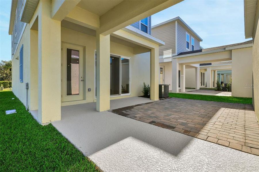 Exterior details and patio area of a home in Serenade at Ovation, Winter Garden (Image 3).
