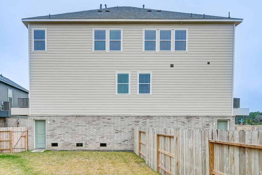 Exterior details and patio area of a home in Townsen Landing, Humble (Image 26). Exterior details and patio area of a home in Townsen Landing, Humble (Image 26).