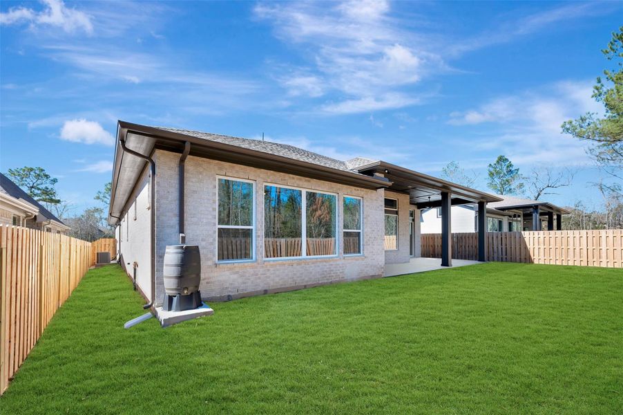 Fully sodded & fenced rear yard with sprinkler system & full gutters.