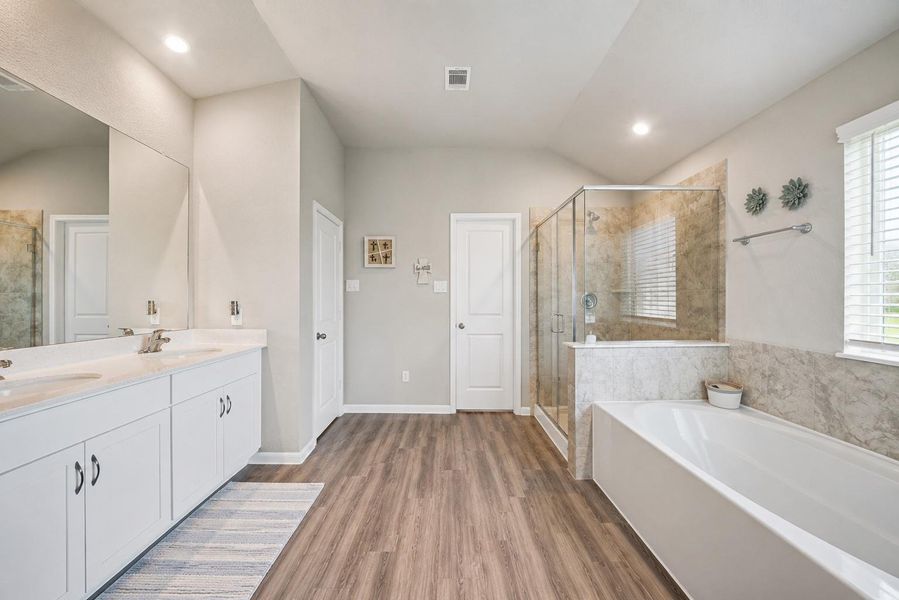 Furnished interior view inside a new home in Sweetgrass Village, Crosby (Image 14).