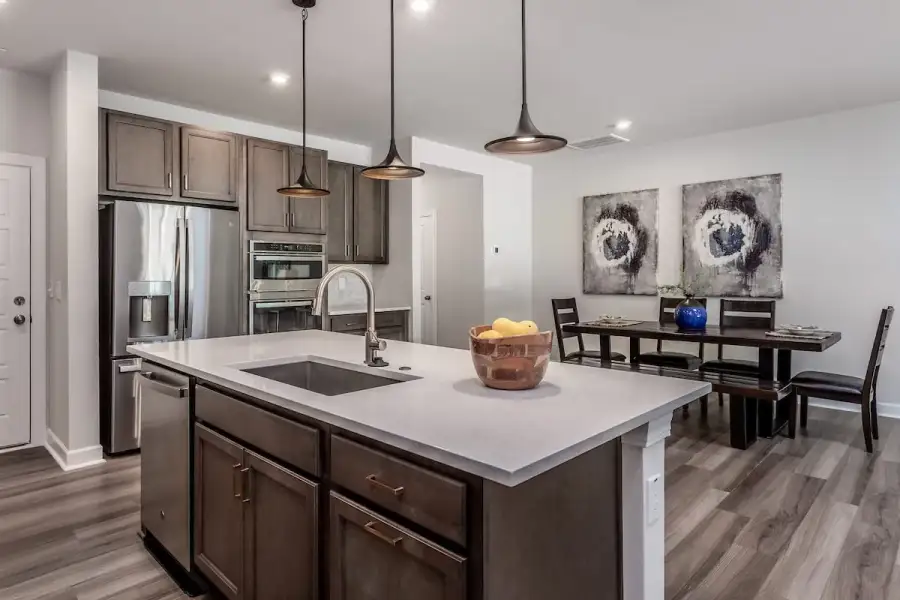 Furnished interior view inside a new home in The Townes at Willow Park, Cary (Image 6).