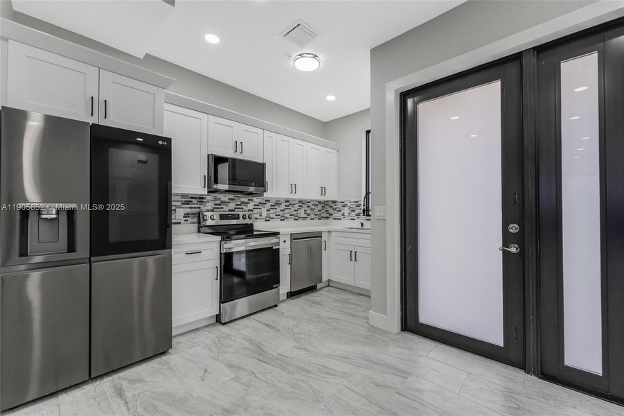 Furnished interior view inside a new home in , Miami (Image 8).