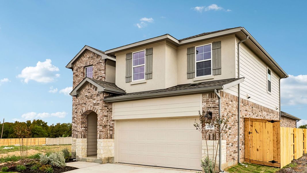 Front exterior of a new home in Briarwood, Elgin, TX, highlighting curb appeal (Image 17).
