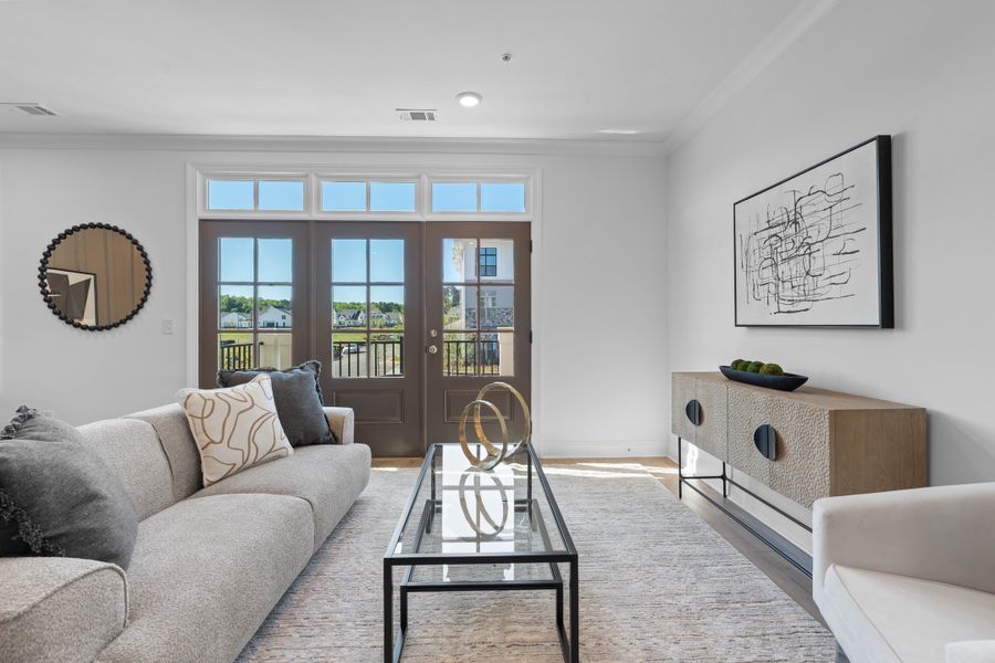Representative furnished interior of a home built from the The Oleander by The Providence Group in Market Square at Sawnee Village, Cumming (Image 22).
