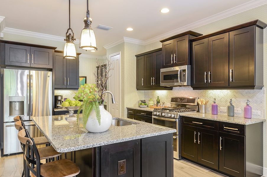 Representative furnished interior of a home built from the White Star by Neal Communities in SkySail, Naples (Image 7).