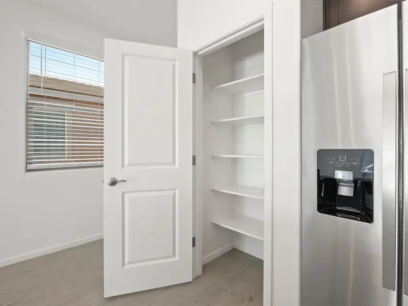 Furnished interior view inside a new home in Mandarina - Signature Series, Marana (Image 4).