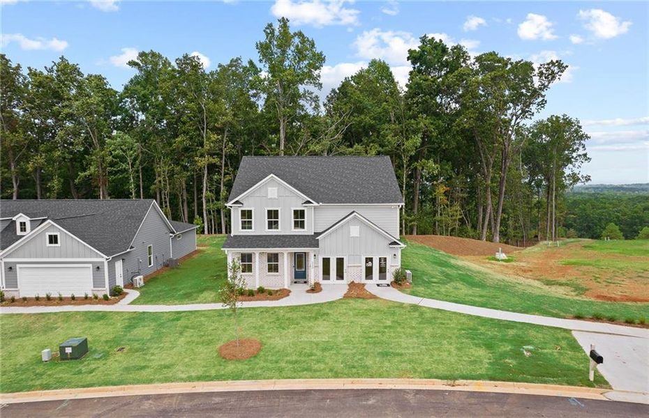 Front exterior of a new home in Watermist at Mirror Lake, Villa Rica, GA, highlighting curb appeal (Image 27).