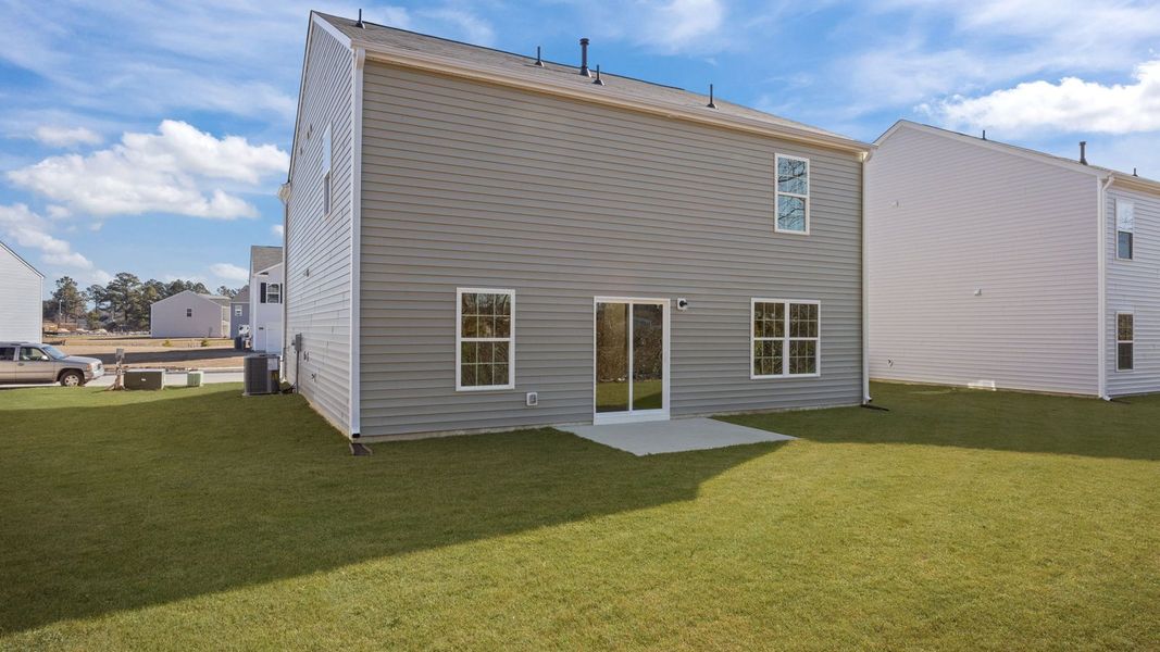 Exterior details and patio area of a home in Madeline Farm, New Bern (Image 21).