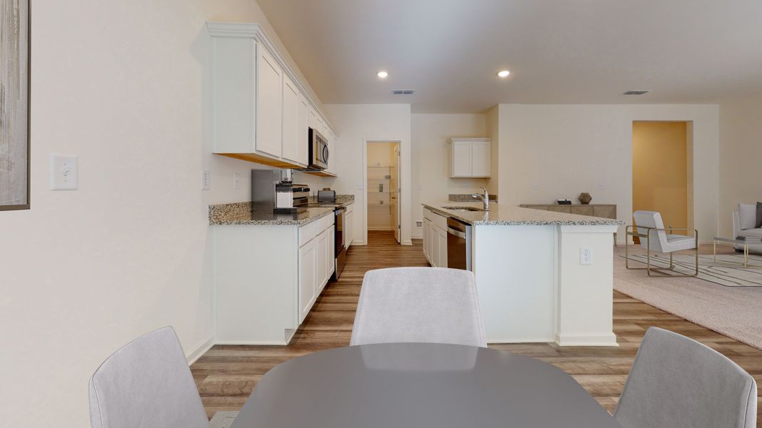 Representative furnished interior of a home built from the Vega by Starlight Homes in Oakfield Lakes, Parrish (Image 3). Representative furnished interior of a home built from the Vega by Starlight Homes in Oakfield Lakes, Parrish (Image 3).