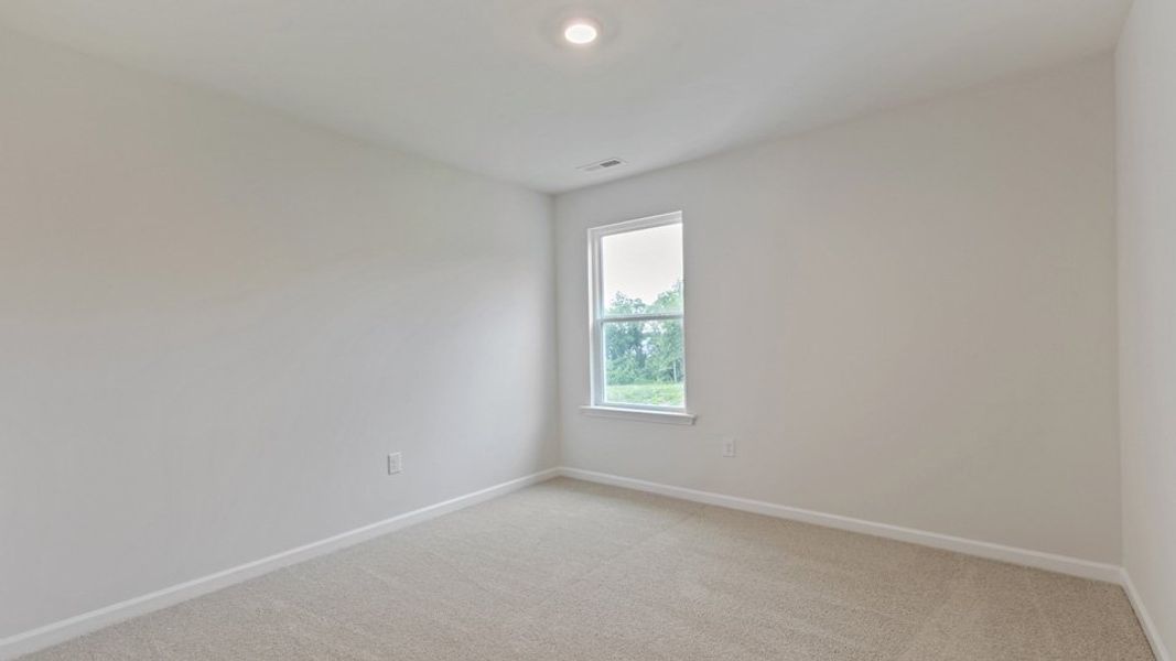 Spacious, unfurnished interior of a new home in The Grove at Matthews Landing, Fuquay Varina (Image 16).