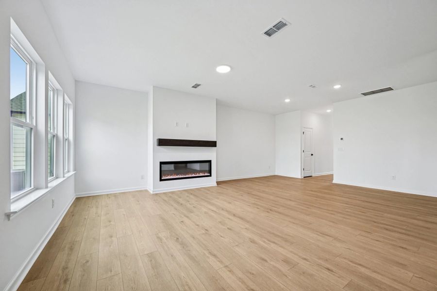 Family Room featuring the AW Collection® Sapphire - Bold tones and playful patterns shine here. Family Room featuring the AW Collection® Sapphire - Bold tones and playful patterns shine here.